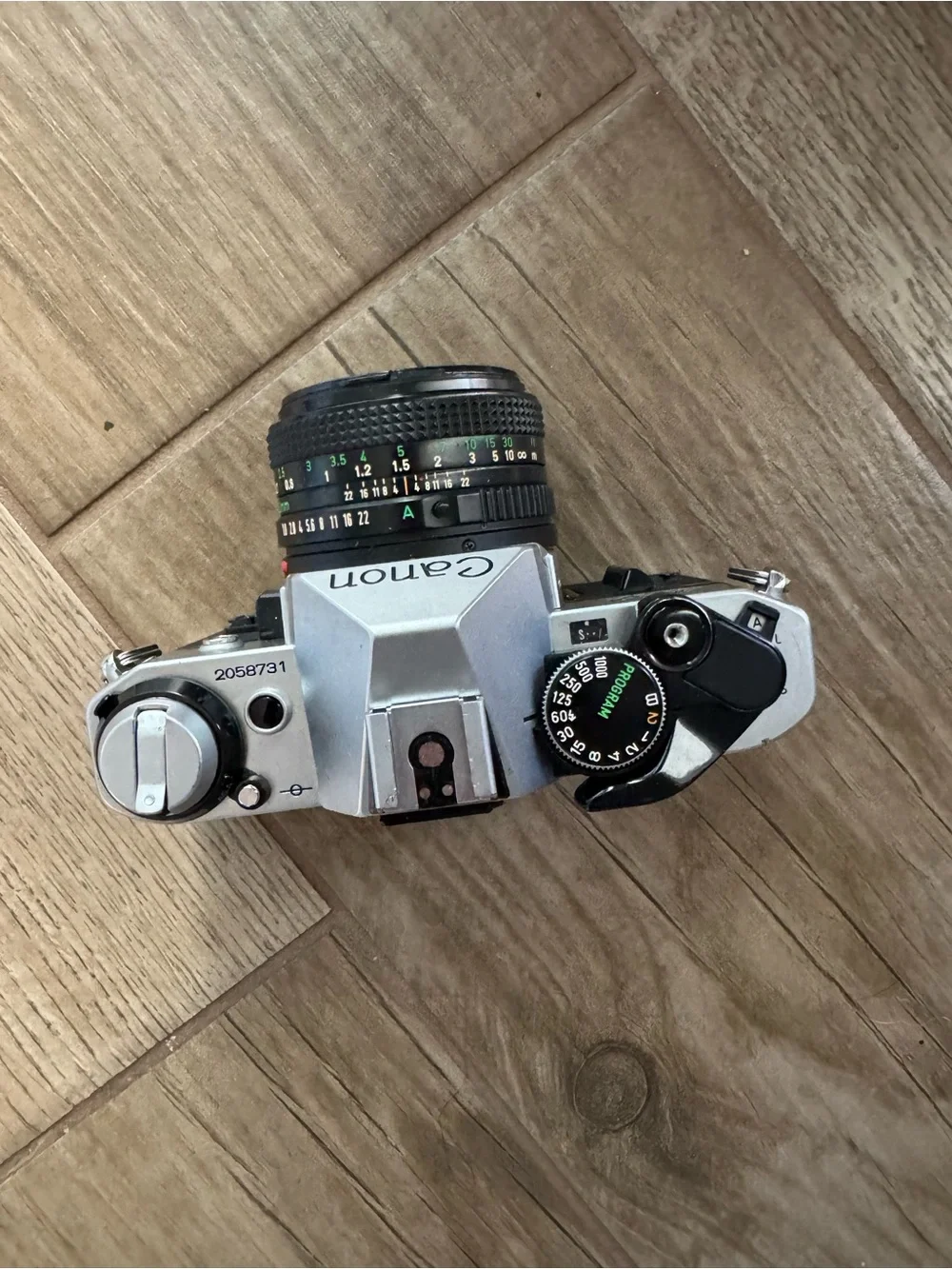 Canon AE-1 Program Film Camera in Black and Silver